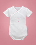 Sardon blanco y rosado con puntitos para bebé niña, vista de frente | JR Baby Center