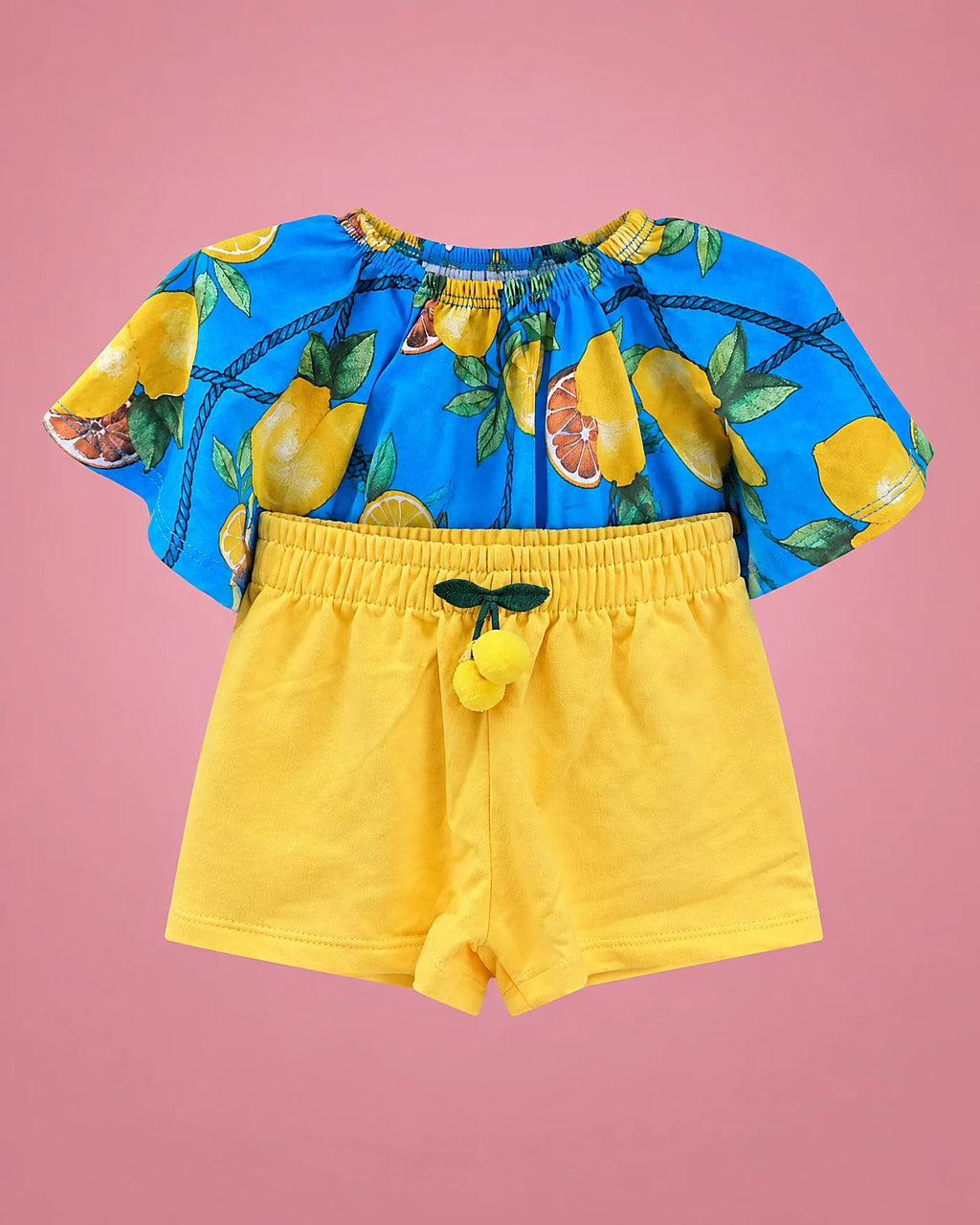 Conjunto de blusa azul con limones y short amarillo para niña, vista de la blusa y el short amarillo | JR Baby Center