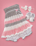 Conjunto tejido a mano gris y rosado para recién nacida, vista de frente | JR Baby Center