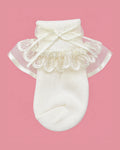 Medias Piccolo crema con encaje y lacito para bebé niña | JR Baby Center