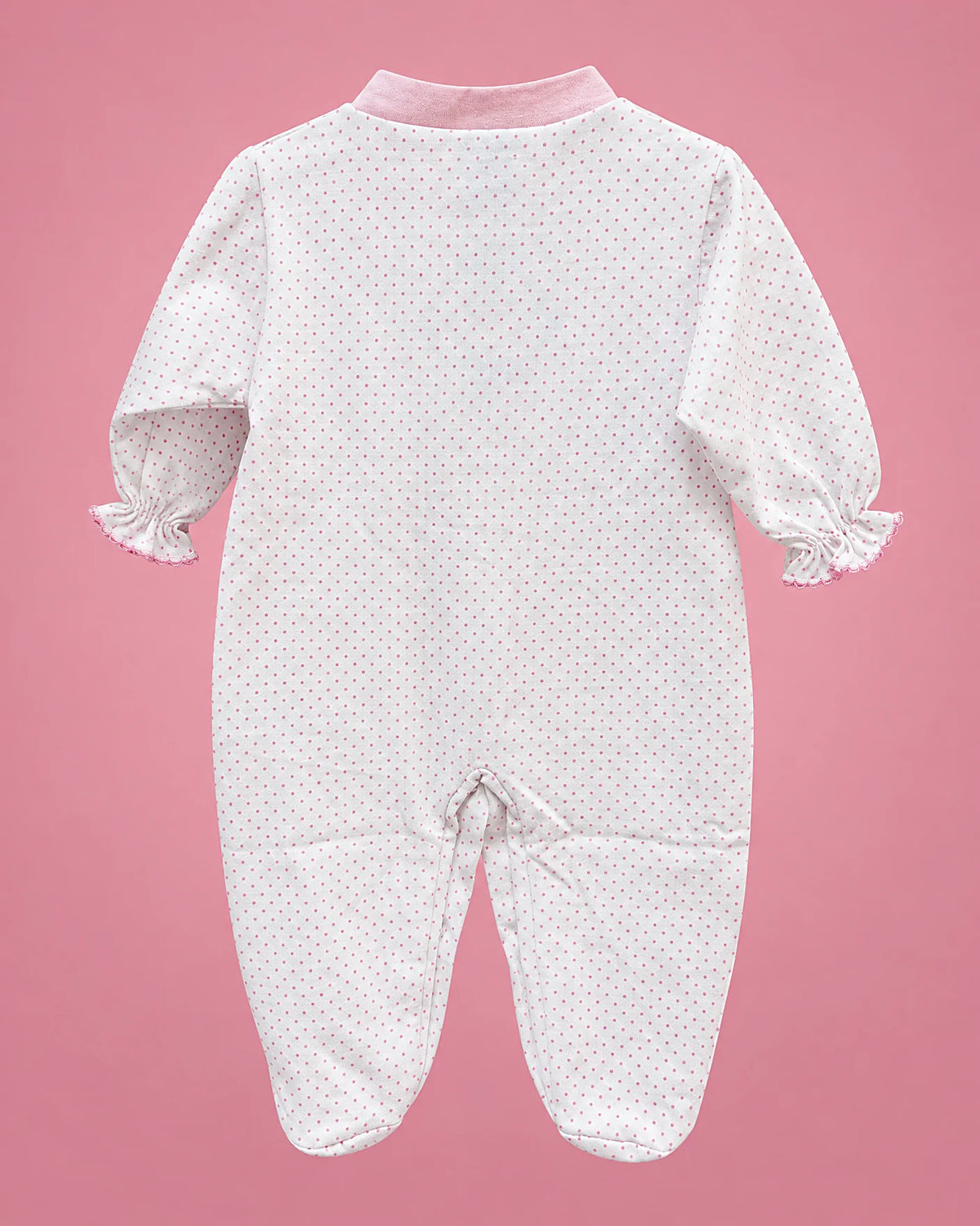 Pijama blanca con puntitos y lacitos rosados para bebé niña, vista de espalda | JR Baby Center