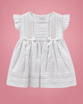 Vestido de bautizo blanco con lacitos y bandas de encaje para bebé niña, vista de frente | JR Baby Center