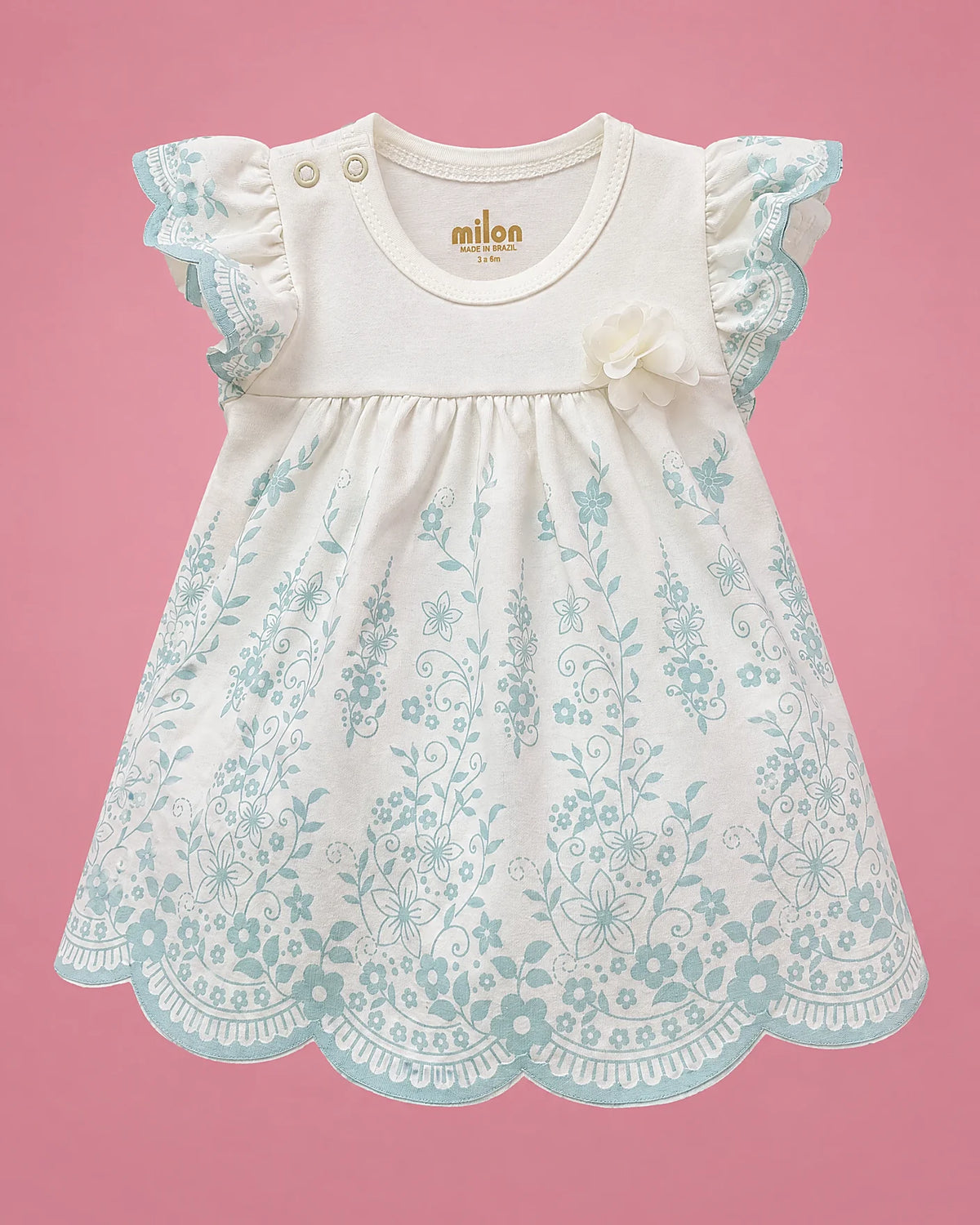 Vestido blanco con flores aqua y borde ondulado para bebé niña, vista de frente | JR Baby Center