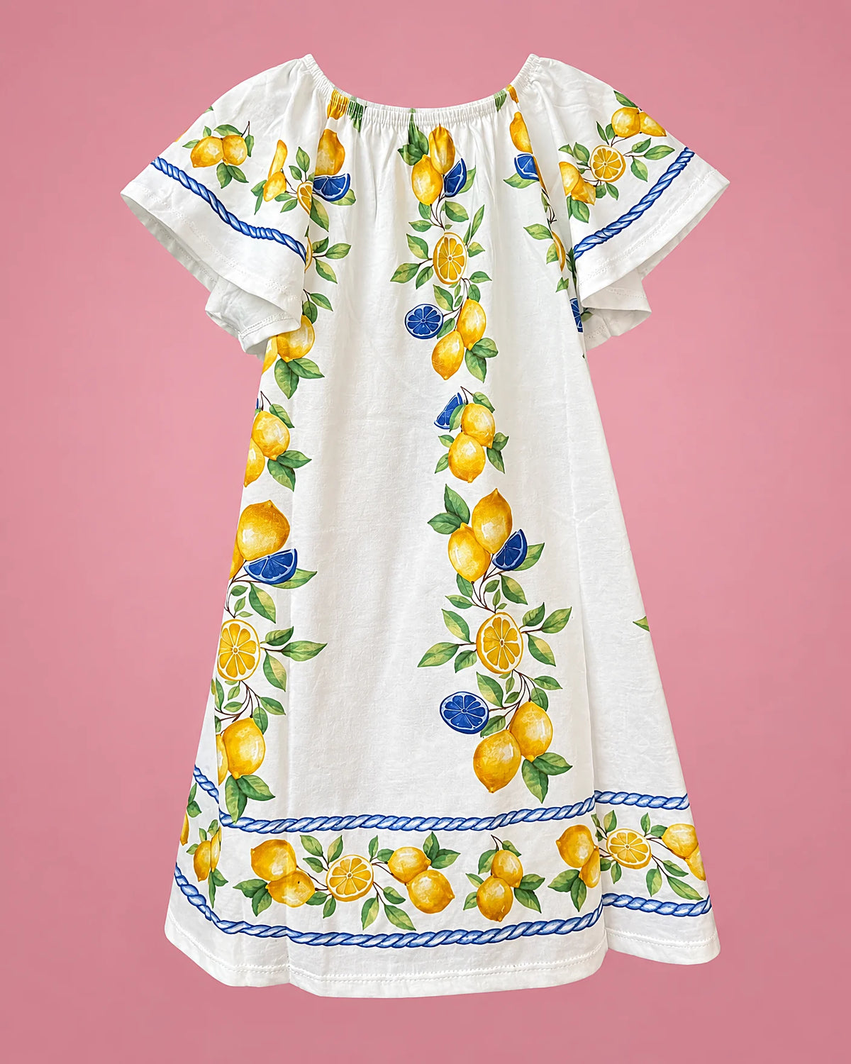 Vestido blanco de mangas mariposa con limones y ribete azul para niña, vista de espalda | JR Baby Center