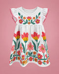 Vestido blanco con tulipanes y flores de colores para niña, vista de frente | JR Baby Center