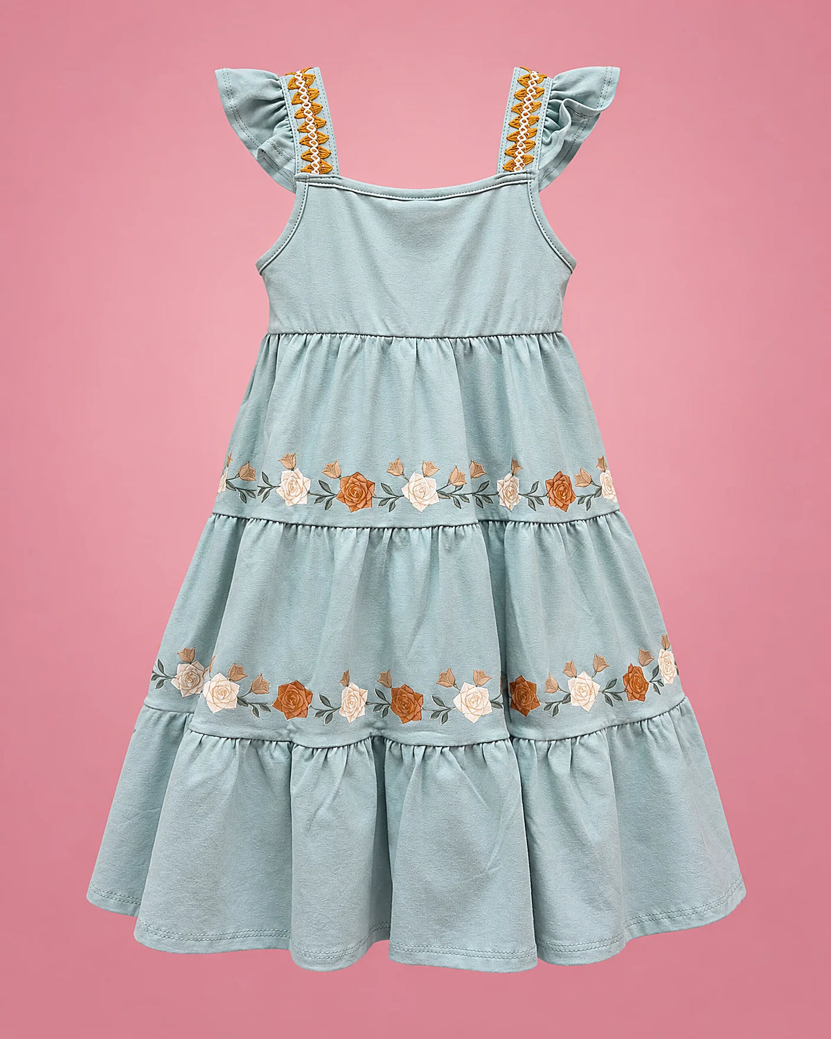 Vestido celeste con flores bordadas naranja y crema en capas para niña, vista de espalda | JR Baby Center