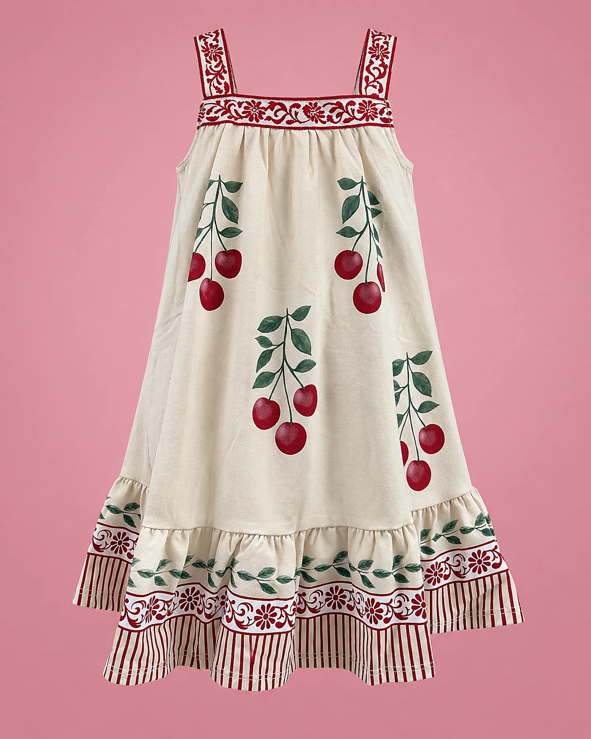 Vestido crema con cerezas rojas y volante de rayas para niña, vista de frente | JR Baby Center