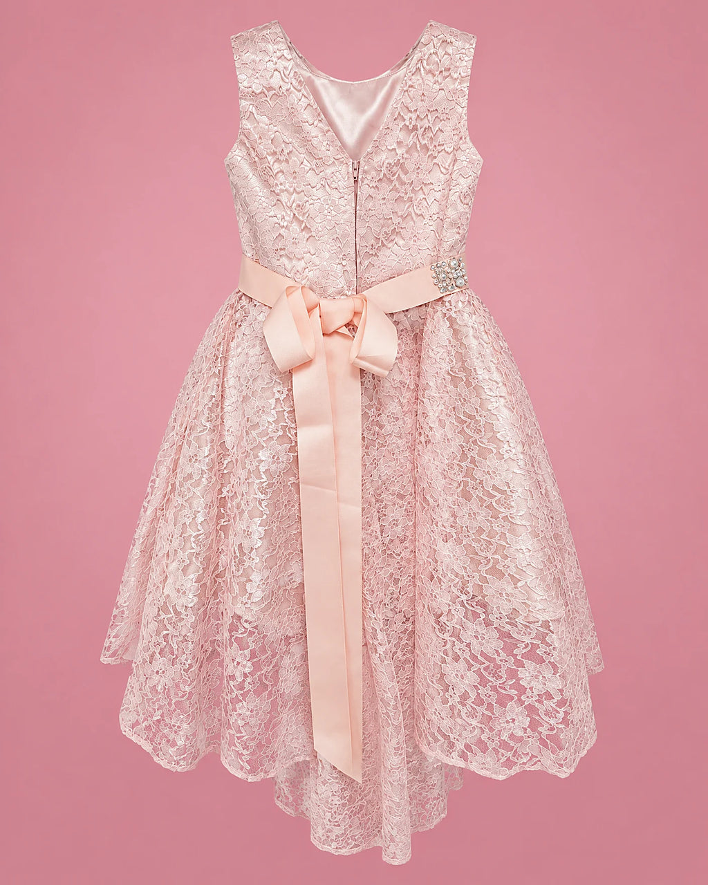Vestido de encaje rosa claro con brillos y lazo melocotón para niña, vista de espalda | JR Baby Center