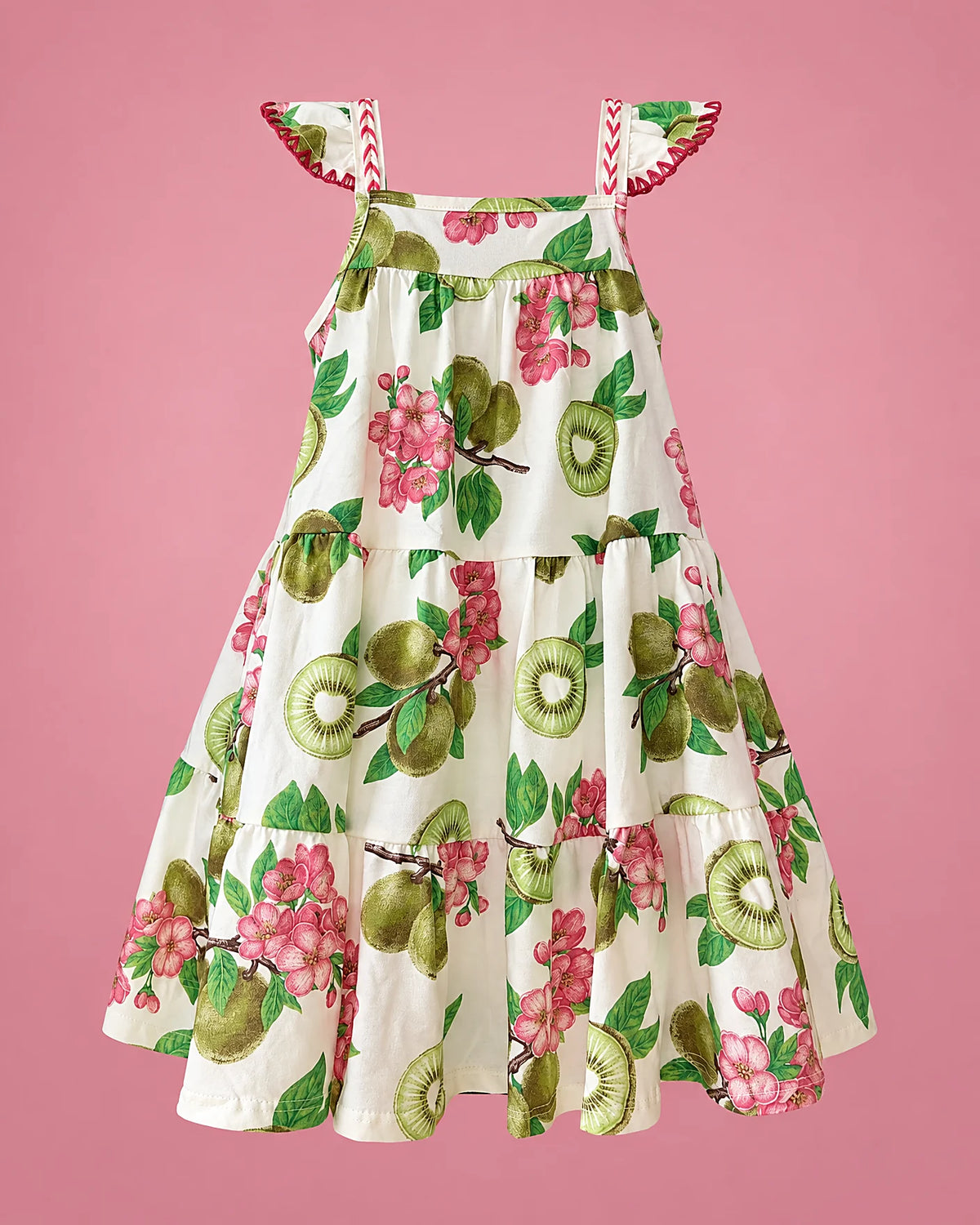Vestido blanco con kiwis y flores rosadas para niña, vista de frente | JR Baby Center