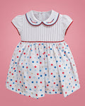 Vestido blanco con lunares de colores y cuello bordado para bebé niña, vista de frente | JR Baby Center