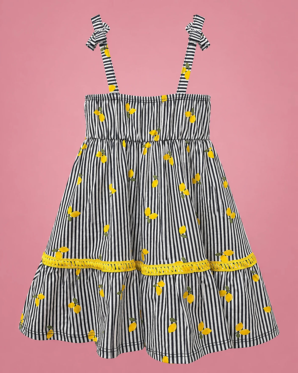 Vestido de rayas azul marino con limones y cinta amarilla para niña, vista de espalda | JR Baby Center