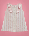 Vestido a rayas rosadas y blancas con cintas rosadas para bebé niña, vista de frente | JR Baby Center