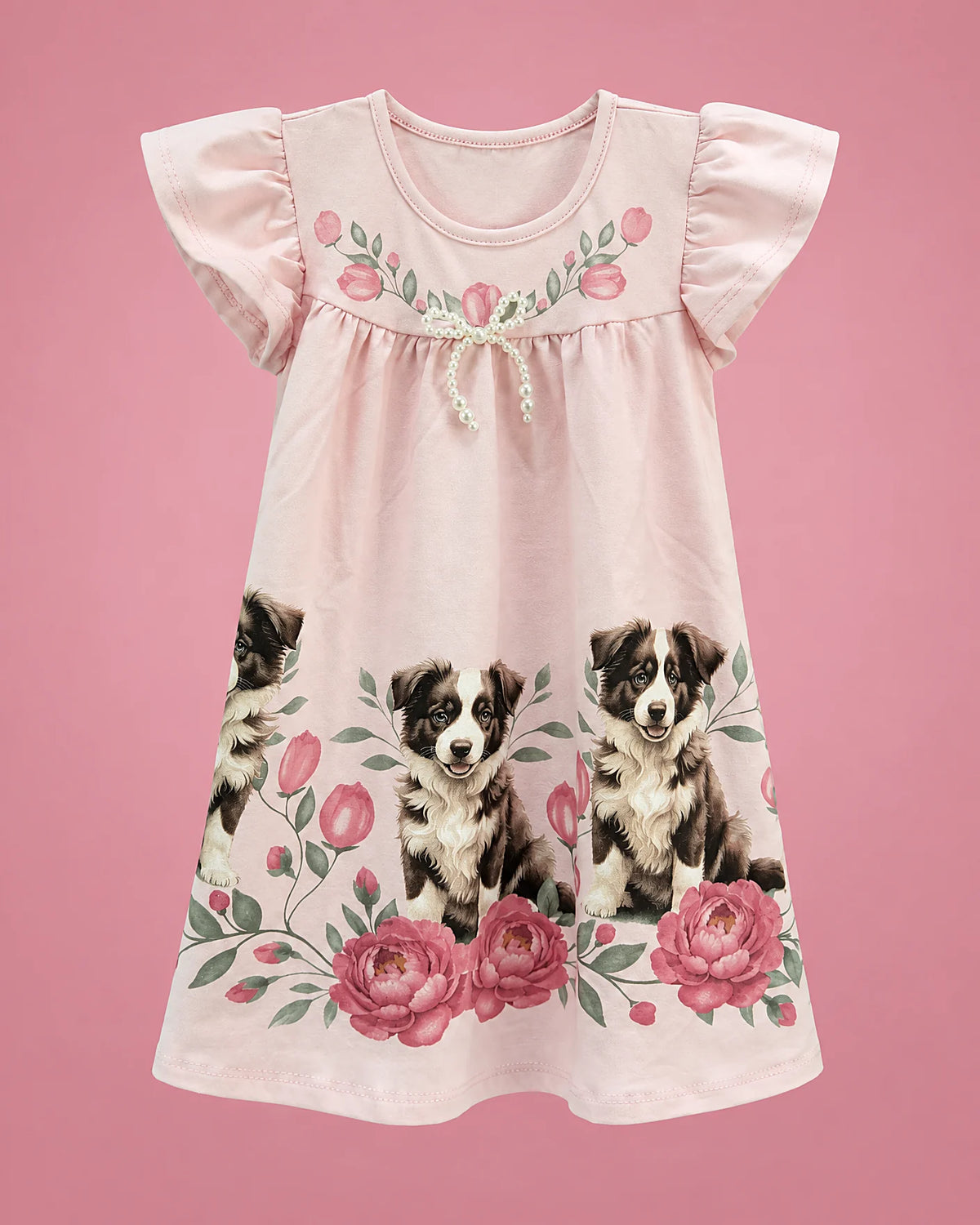 Vestido rosa con perritos y rosas en el borde para niña, vista de frente | JR Baby Center