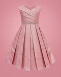Vestido rosado con brillo para niña, vista de frente | JR Baby Center