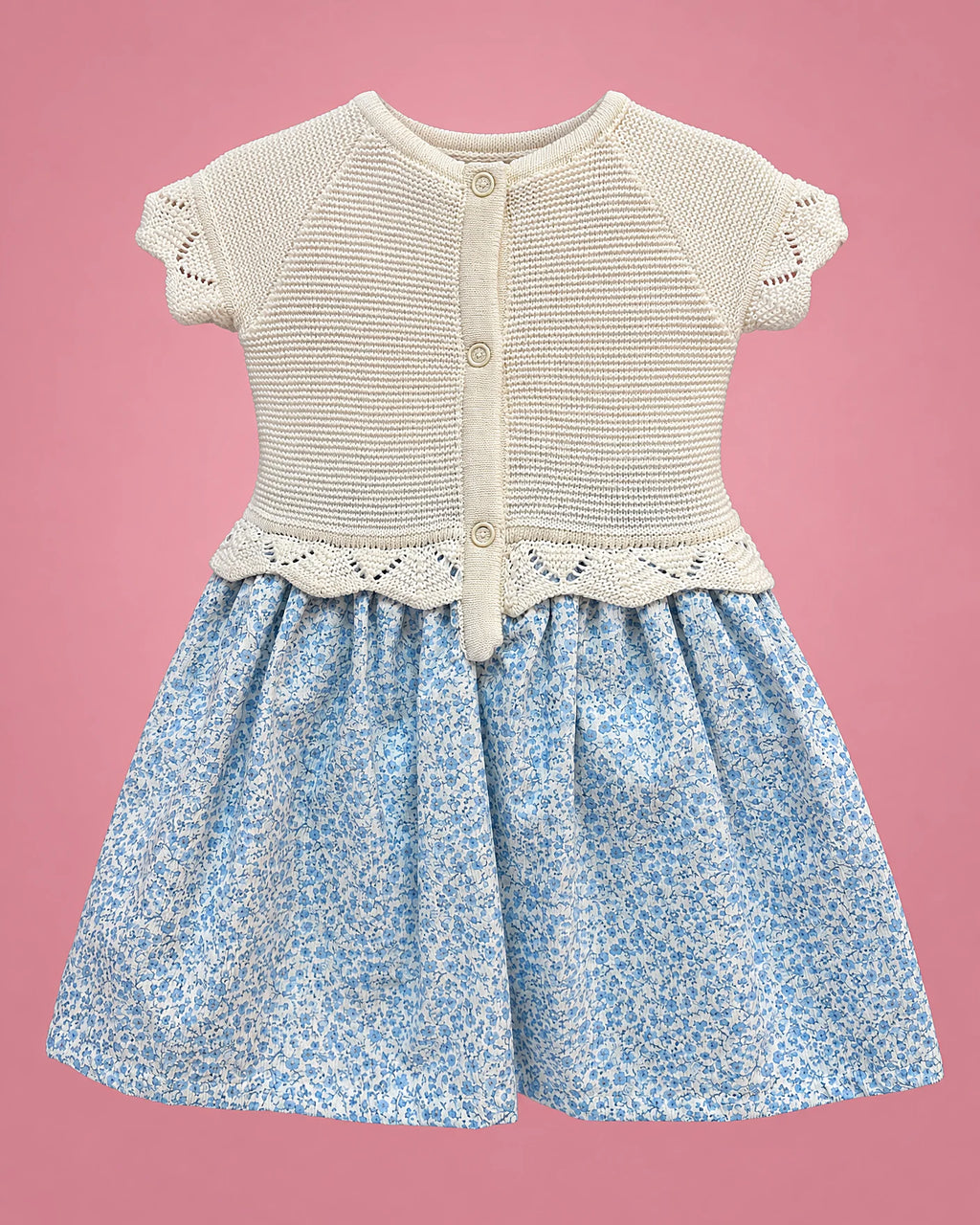 Vestido crema con falda azul floral y lazos celestes para bebé niña, vista de espalda | JR Baby Center