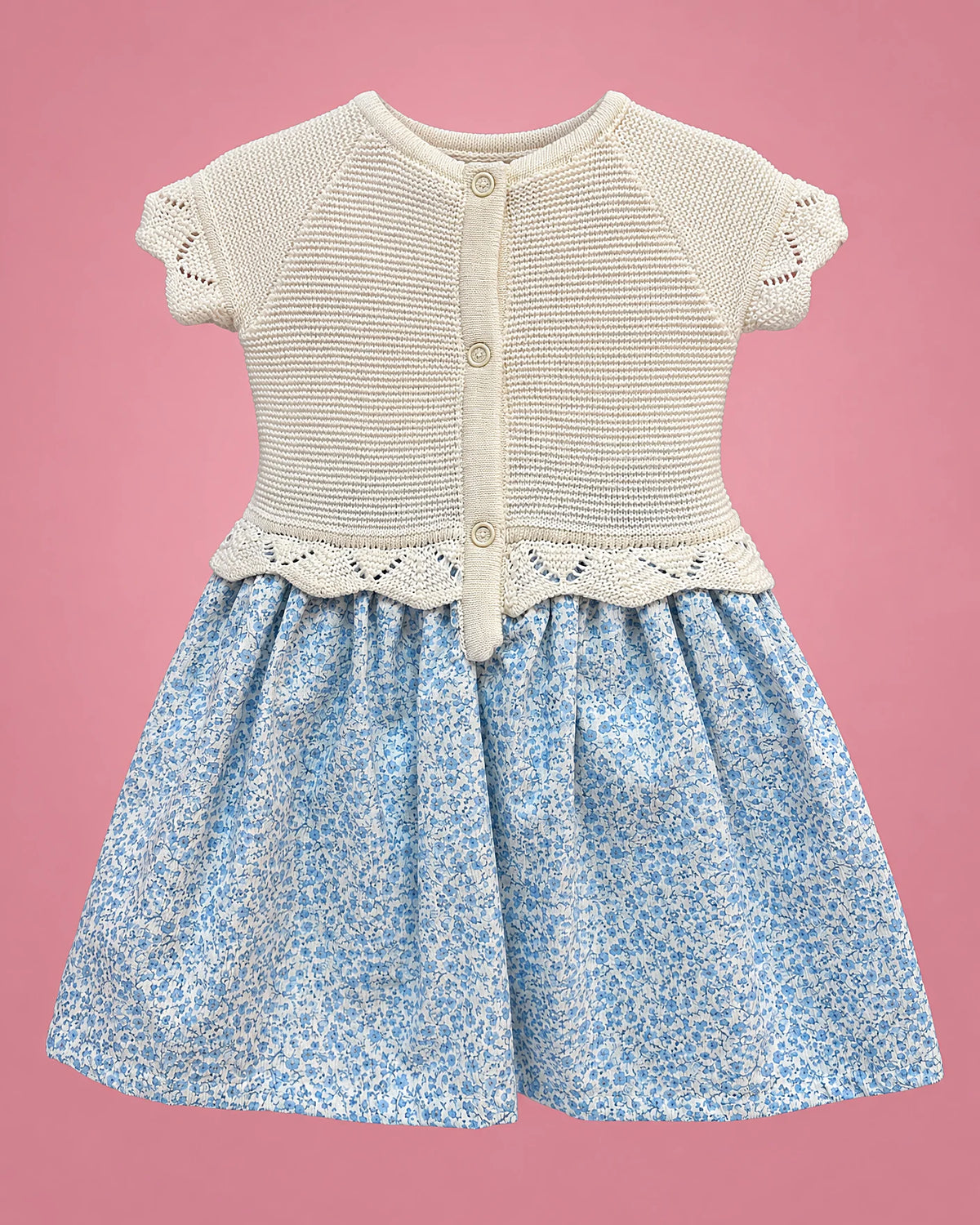Vestido crema con falda azul floral y lazos celestes para bebé niña, vista de espalda | JR Baby Center