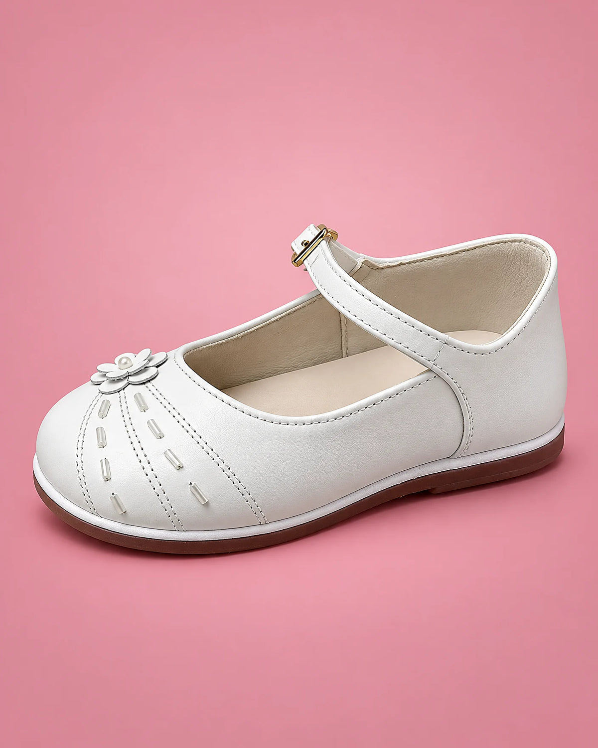 Zapatos de bautizo con rayitas para bebé niña, blancos, vista de lado | JR Baby Center